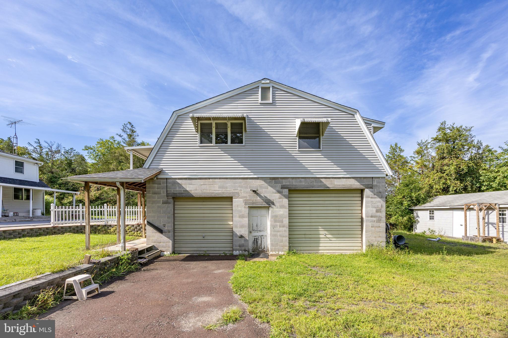 5509 Hoppenville Road Green Lane, PA 18054 - Photo 33 of 70 a front view of a house with a yard