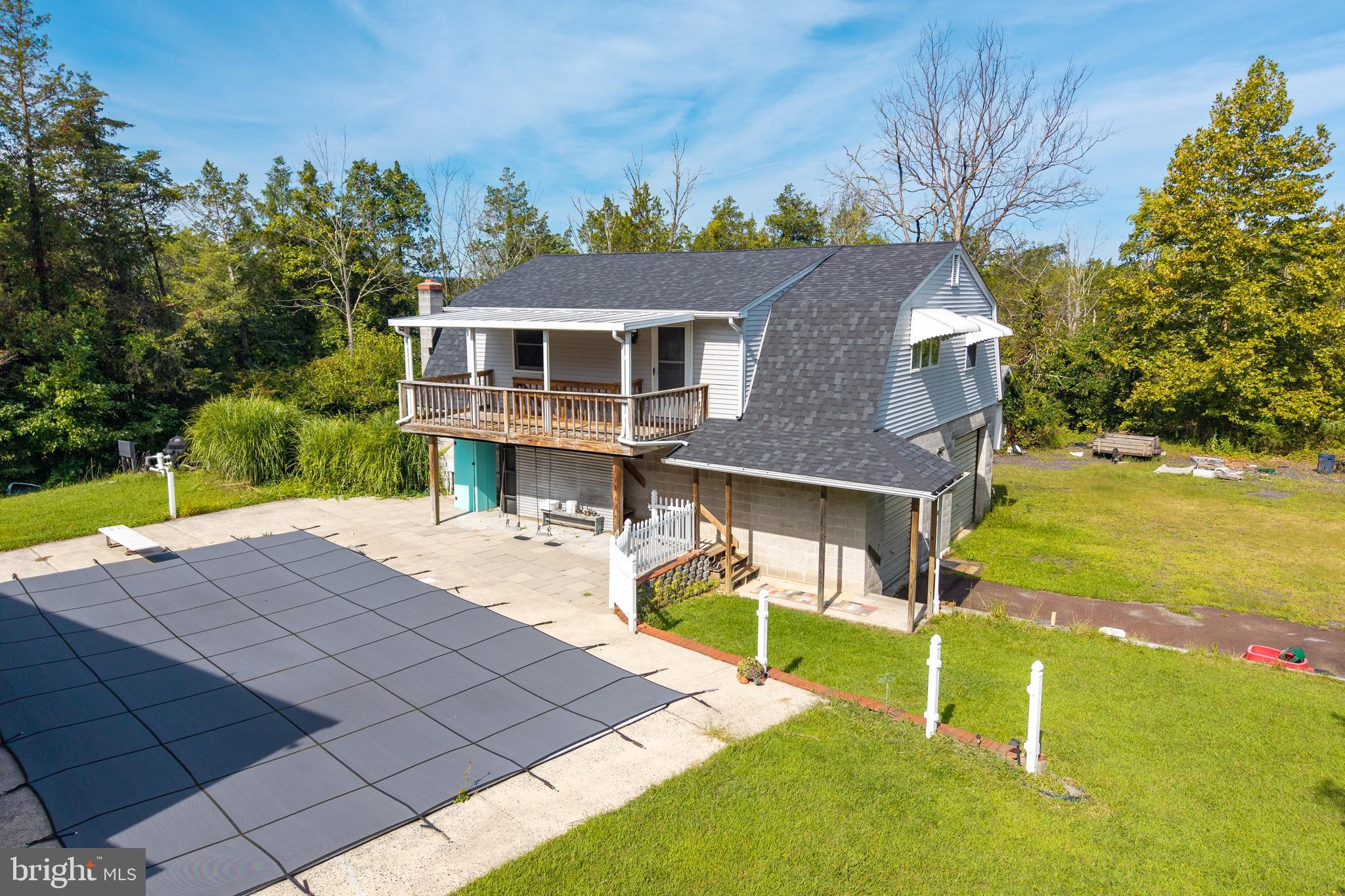 5509 Hoppenville Road Green Lane, PA 18054 - Photo 34 of 70 a aerial view of a house with swimming pool and porch
