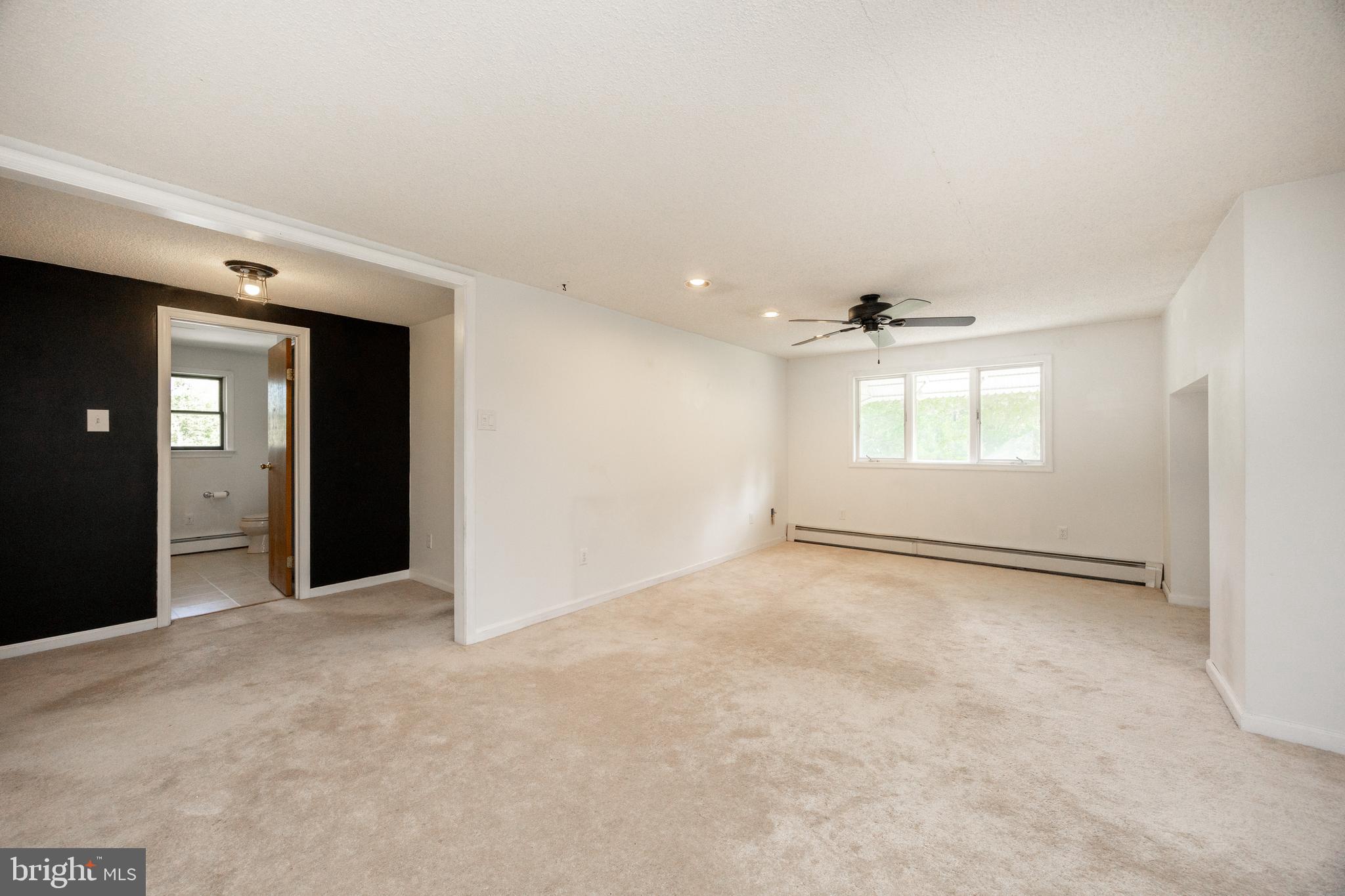 5509 Hoppenville Road Green Lane, PA 18054 - Photo 40 of 70 an empty room with windows and closet