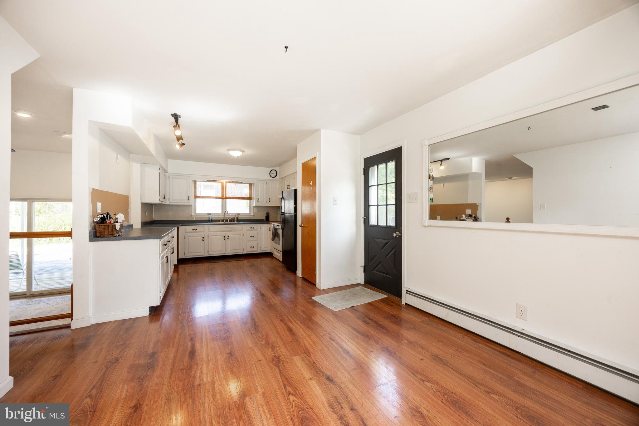 5509 Hoppenville Road Green Lane, PA 18054 - Photo 4 of 70 a view of a kitchen with wooden floor and a kitchen