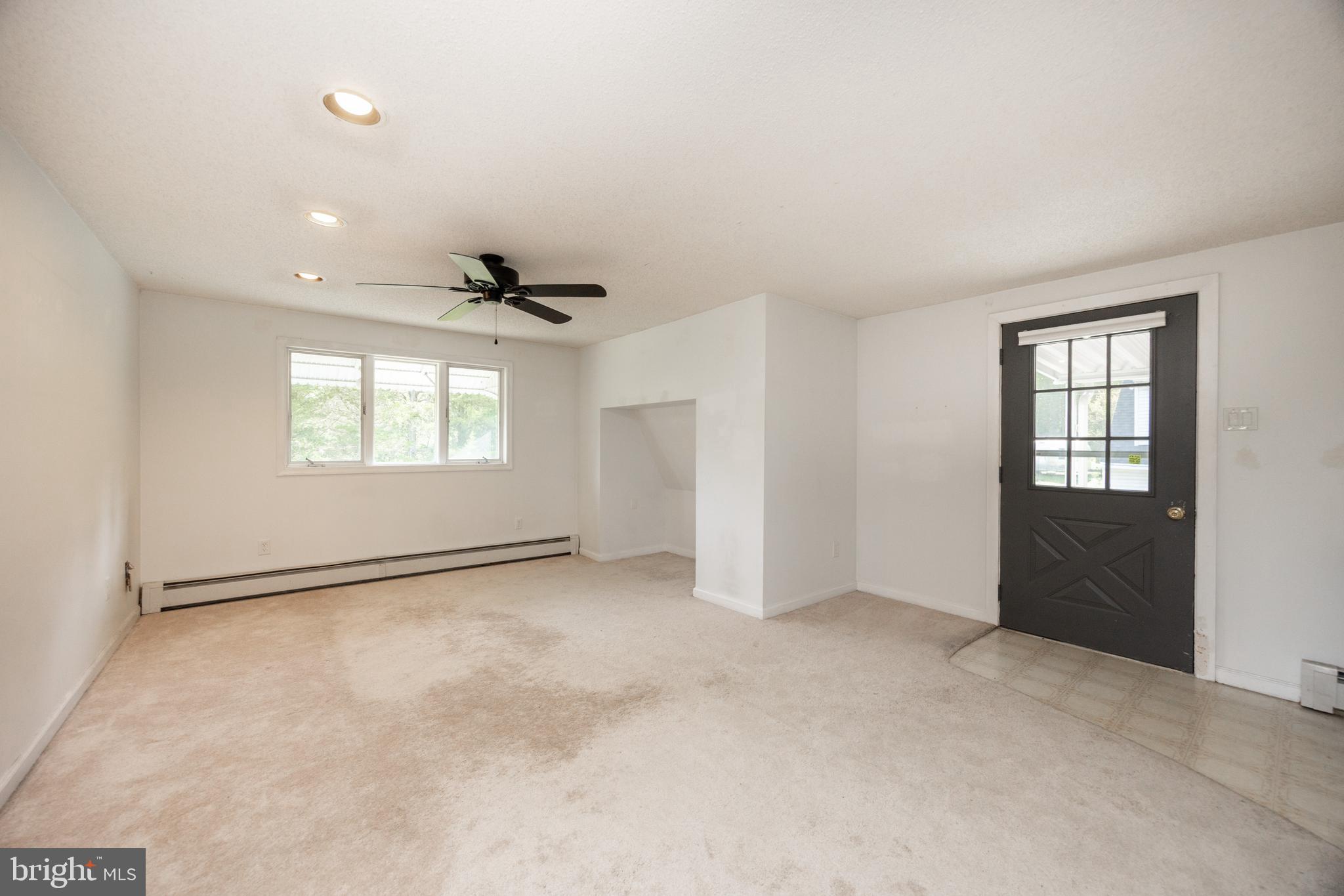 5509 Hoppenville Road Green Lane, PA 18054 - Photo 41 of 70 an empty room with windows and closet