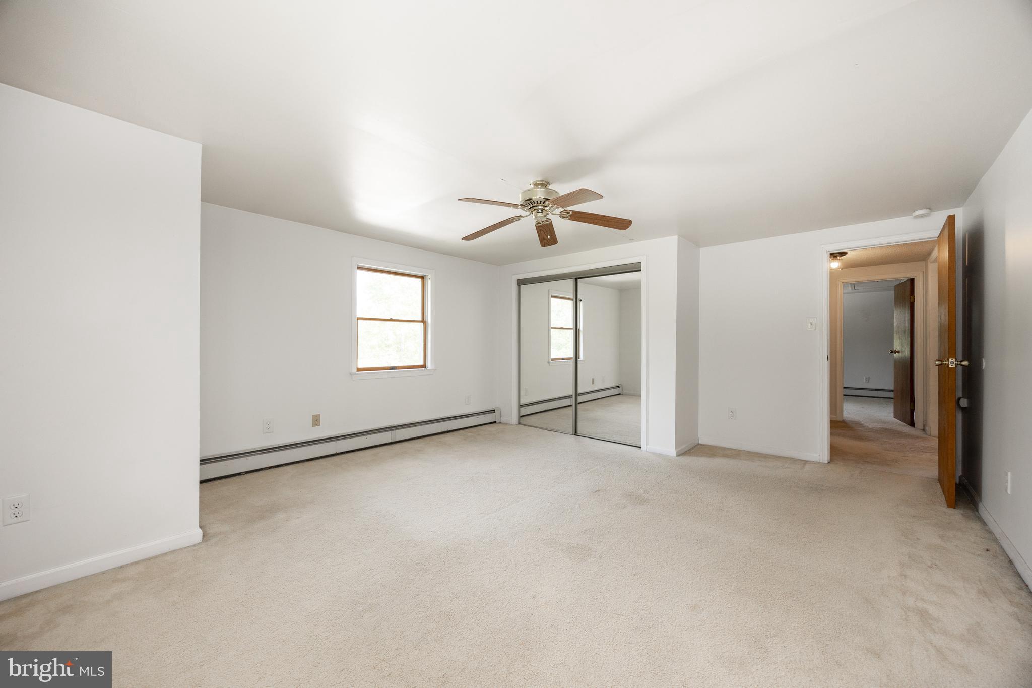5509 Hoppenville Road Green Lane, PA 18054 - Photo 43 of 70 an empty room with windows and closet