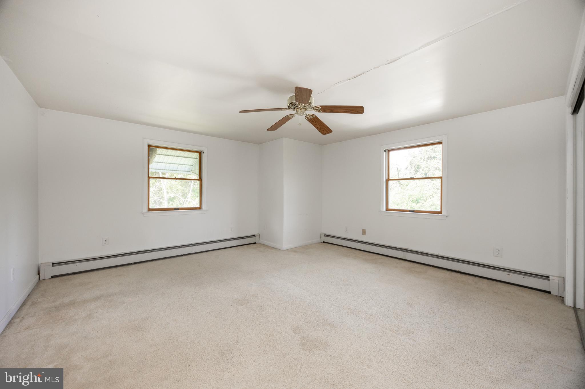 5509 Hoppenville Road Green Lane, PA 18054 - Photo 44 of 70 a view of an empty room with a window