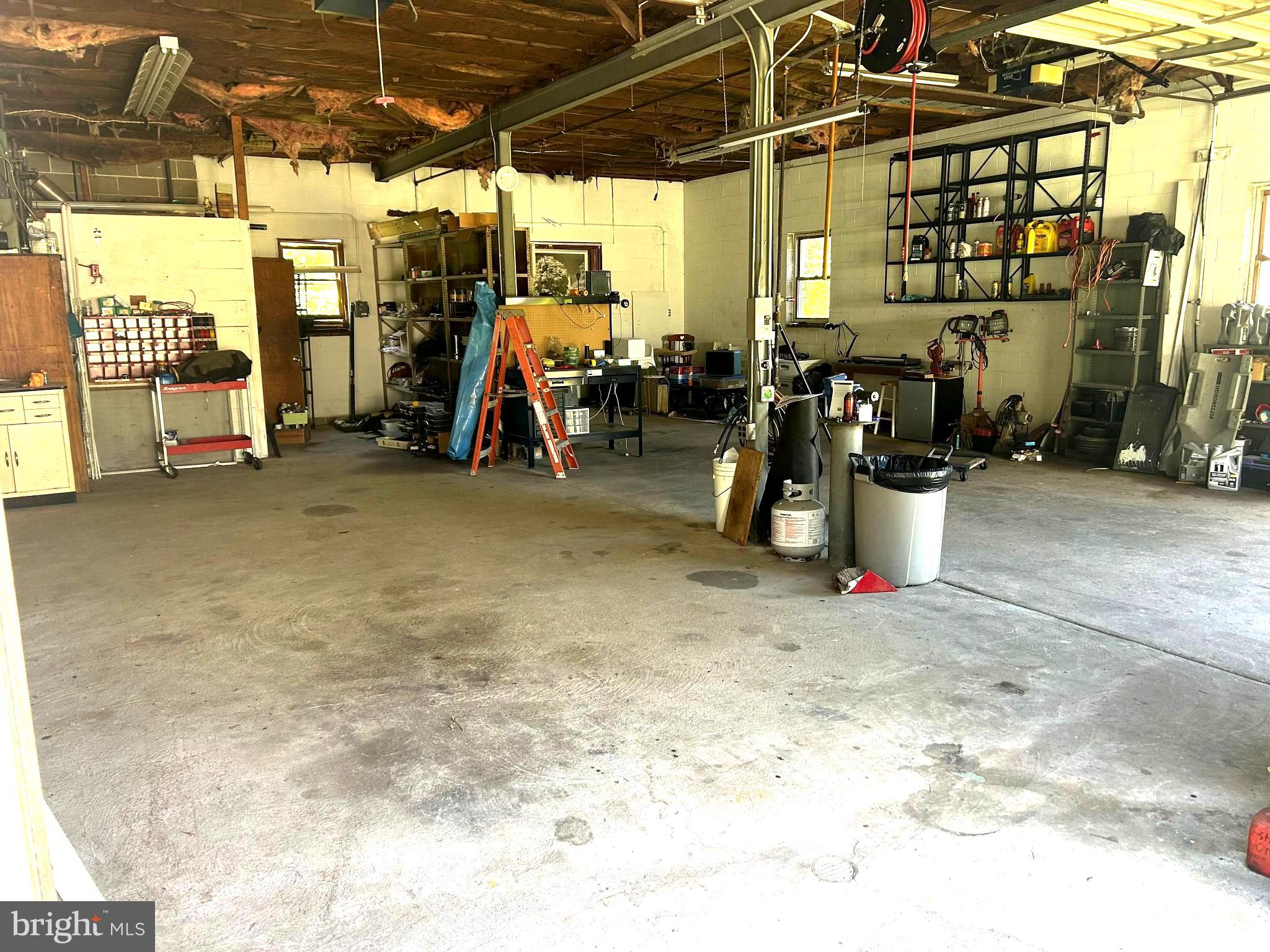5509 Hoppenville Road Green Lane, PA 18054 - Photo 48 of 70 a view of a garage with parked cars