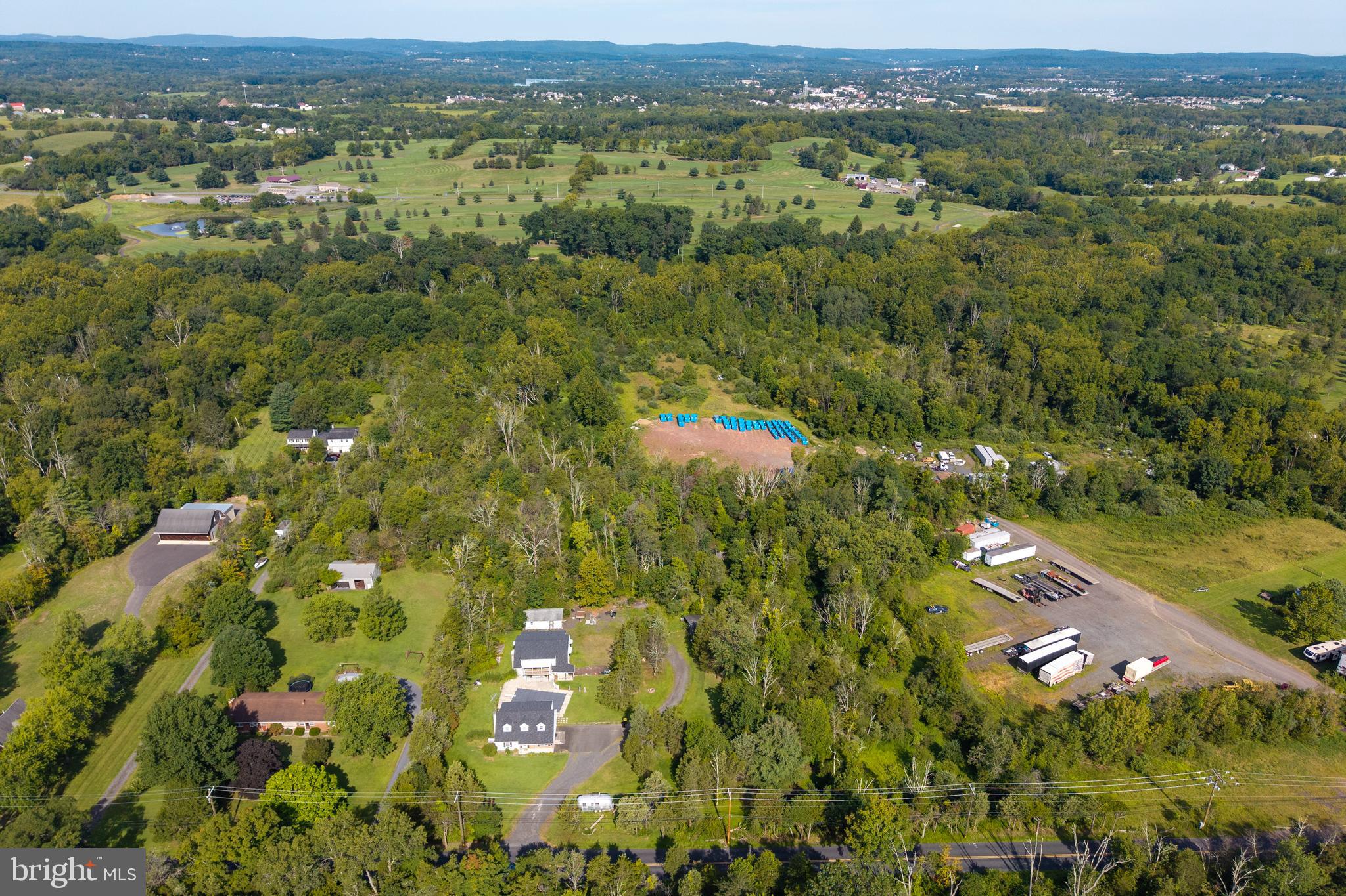 5509 Hoppenville Road Green Lane, PA 18054 - Photo 55 of 70 an aerial view of residential houses with outdoor space and trees