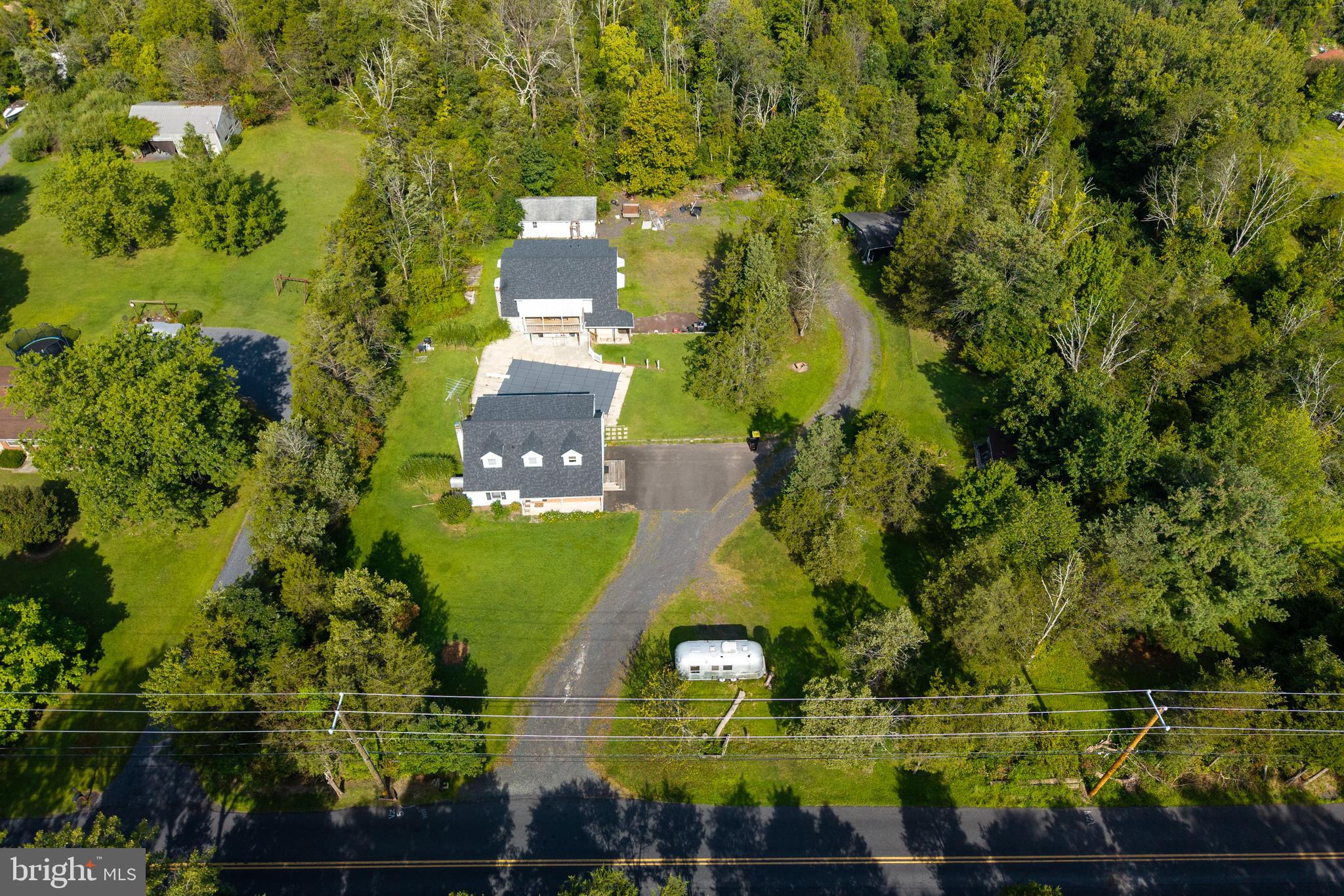 5509 Hoppenville Road Green Lane, PA 18054 - Photo 57 of 70 an aerial view of a residential houses with yard