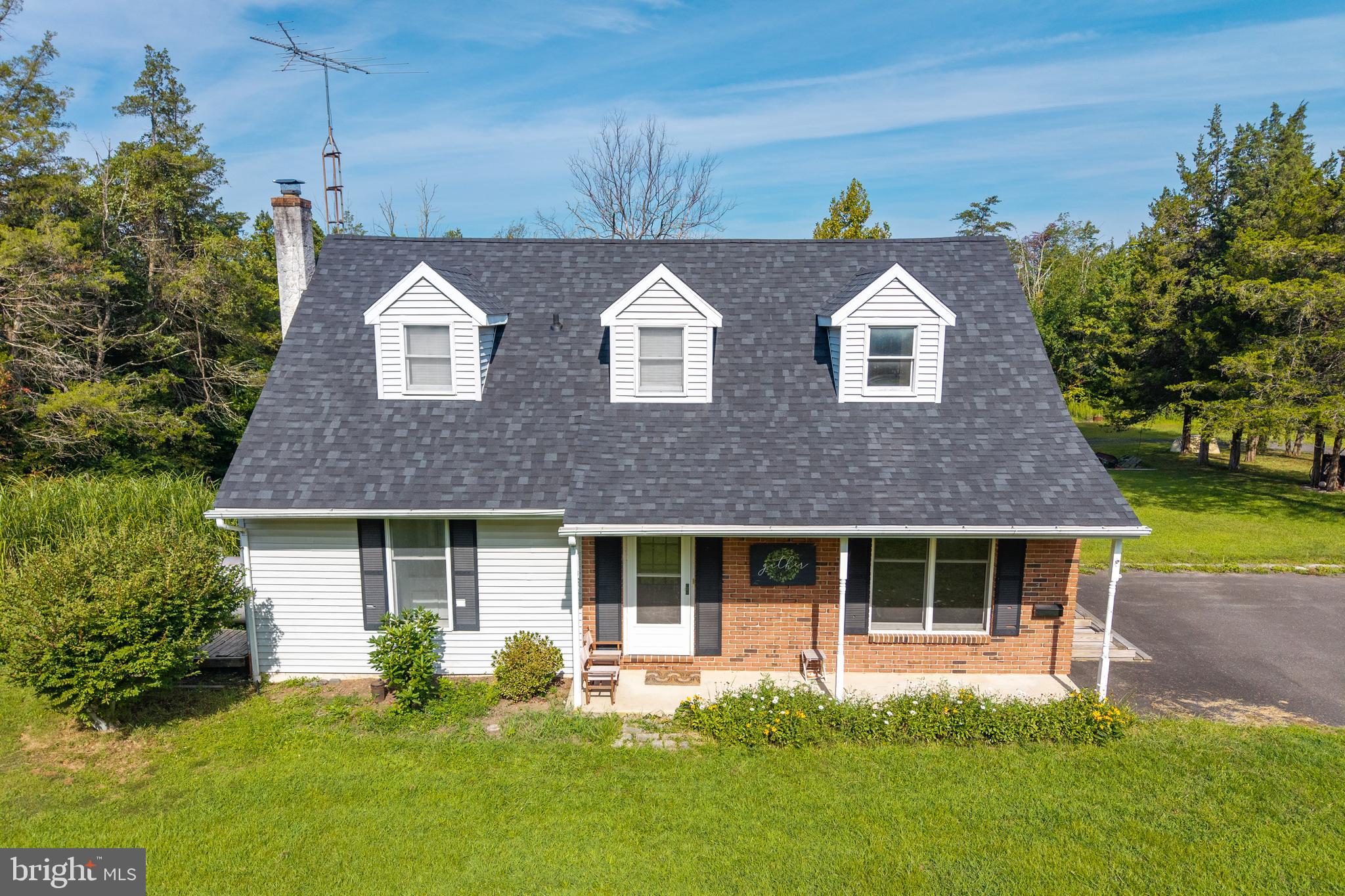 5509 Hoppenville Road Green Lane, PA 18054 - Photo 61 of 70 a front view of a house with a yard