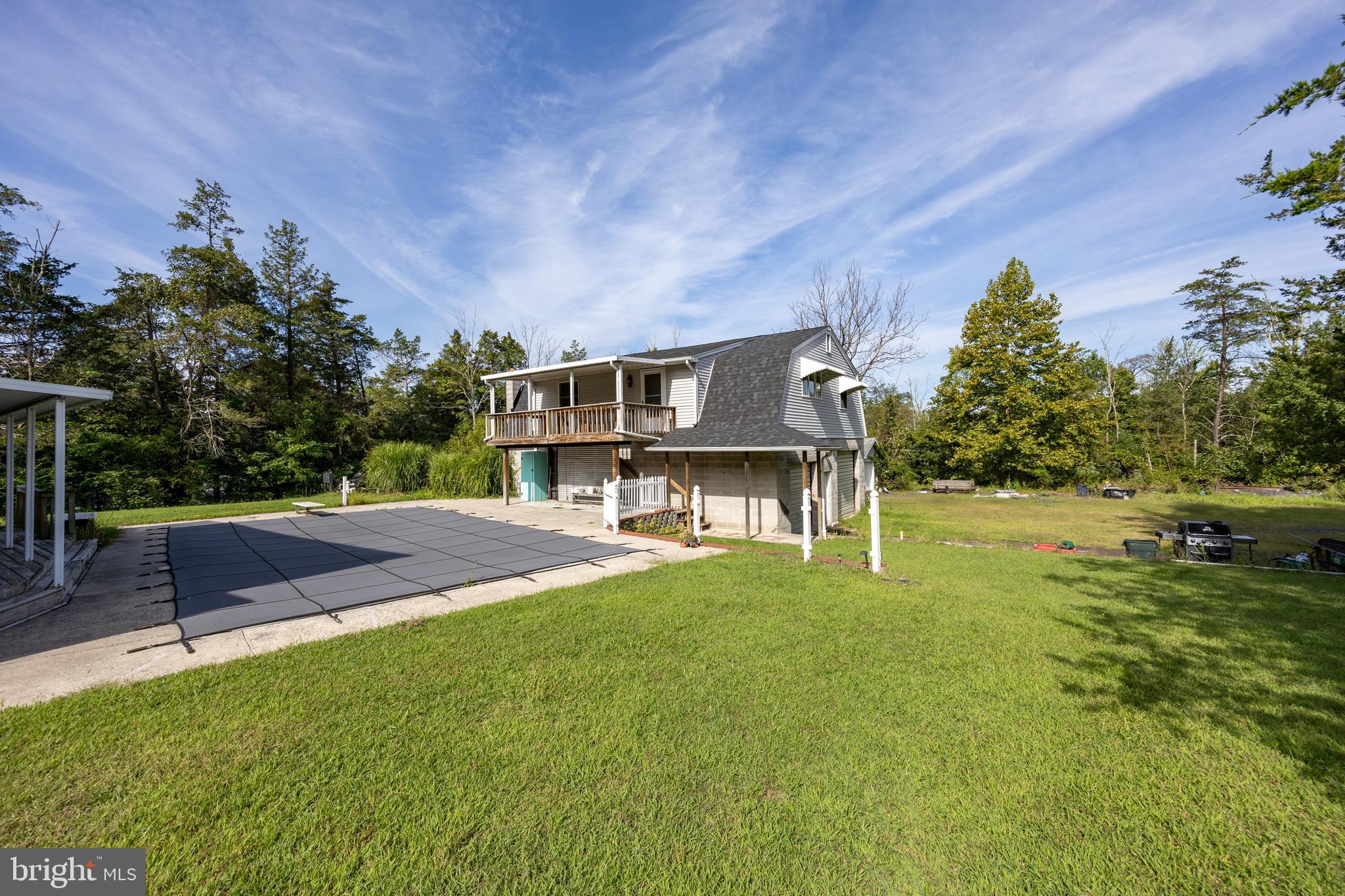 5509 Hoppenville Road Green Lane, PA 18054 - Photo 66 of 70 a swimming pool with outdoor seating and yard