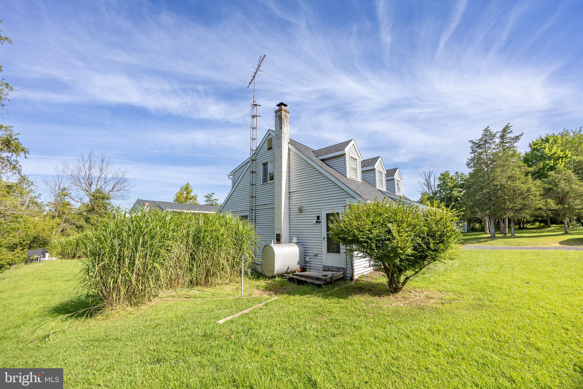 5509 Hoppenville Road Green Lane, PA 18054 - Photo 68 of 70 a house view with swimming pool and garden