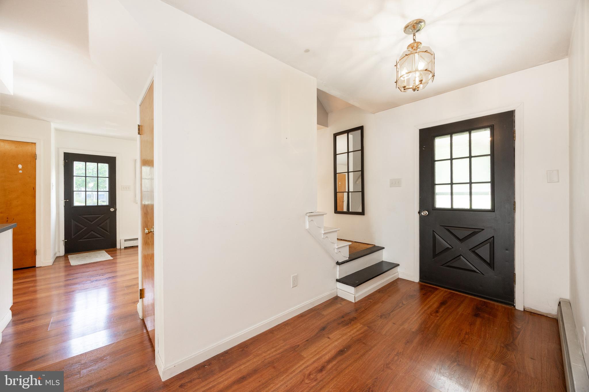 5509 Hoppenville Road Green Lane, PA 18054 - Photo 8 of 70 wooden floor in an empty room with a window and wooden floor