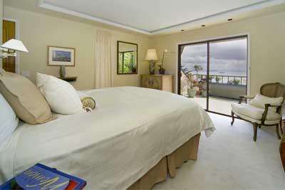 86 Prospect Avenue Sausalito, CA 94965 - Photo 7 of 9 a spacious bedroom with a bed and glass door