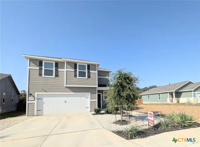 a house view with a outdoor space