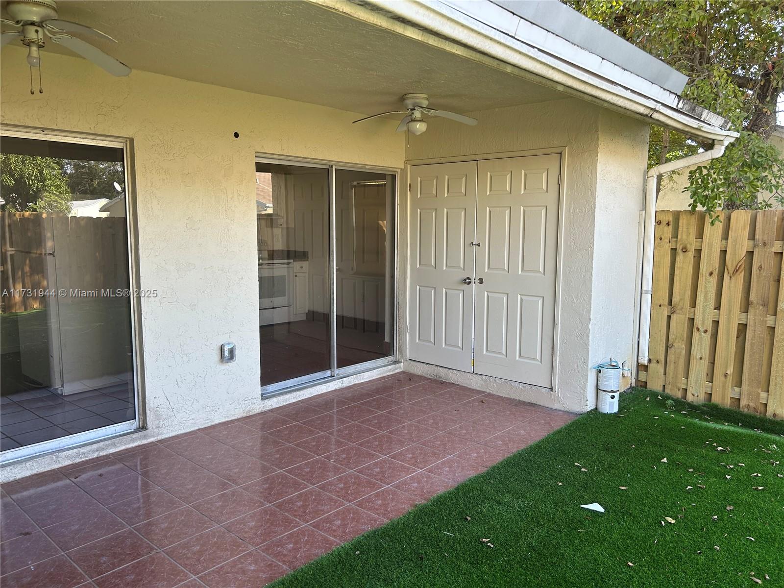 Ives Estates Miami, FL 33179 - Photo 7 of 19 a view of backyard with porch