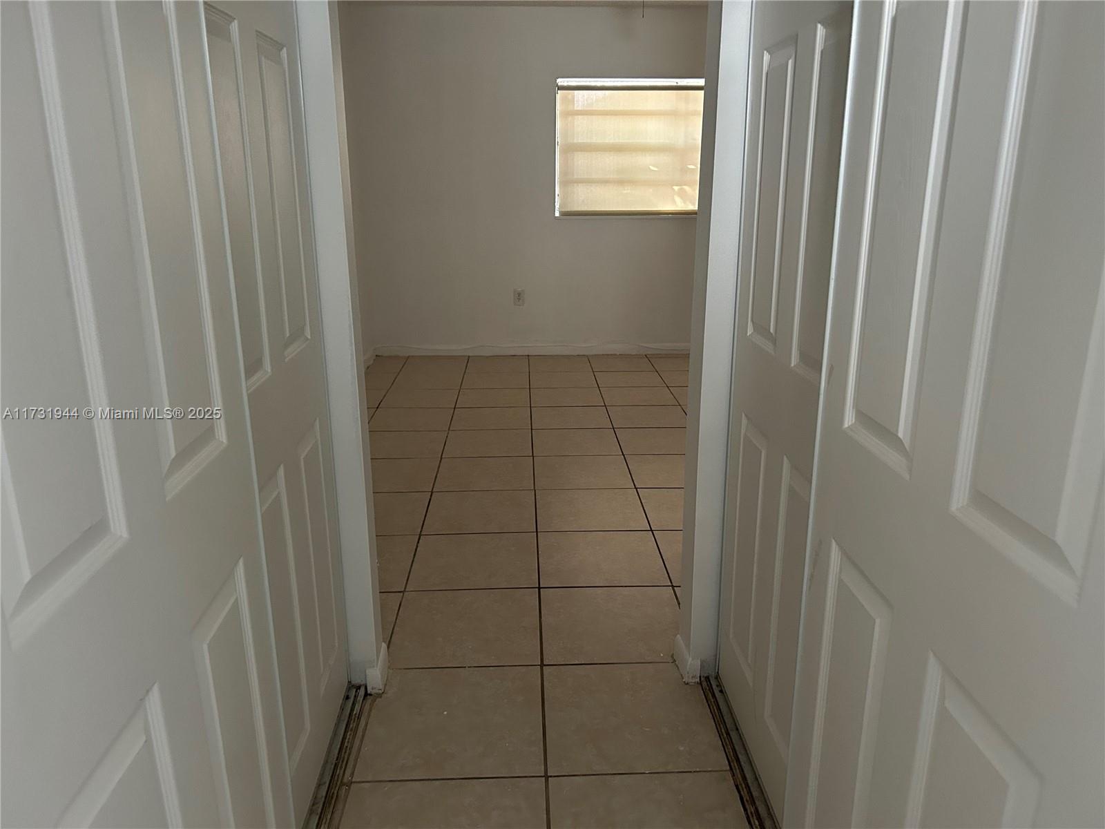 Ives Estates Miami, FL 33179 - Photo 10 of 19 a bathroom with a window