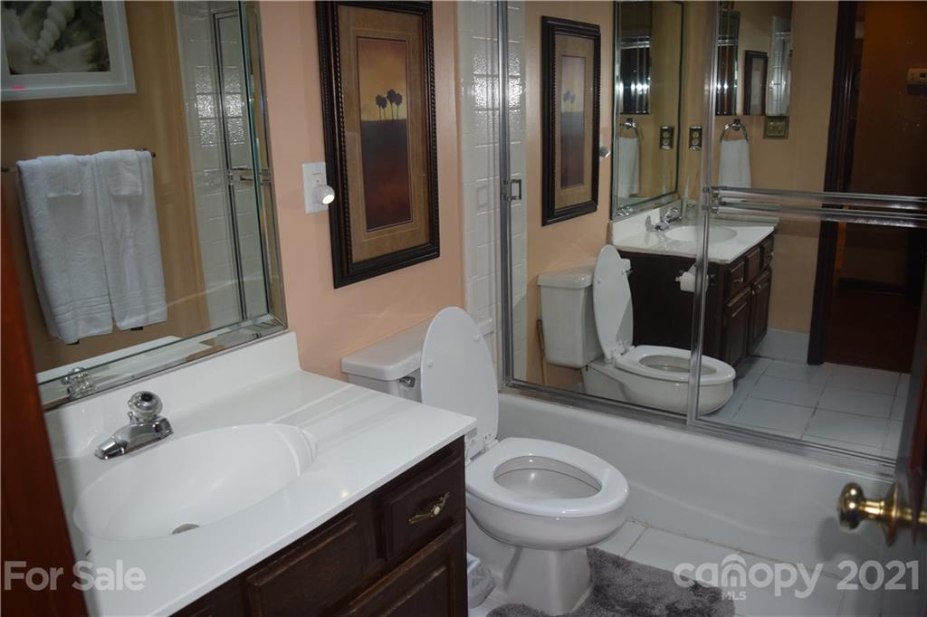 18 Shipmaster Court Lake Wylie, SC 29710 - Photo 16 of 34 a bathroom with a sink and a mirror