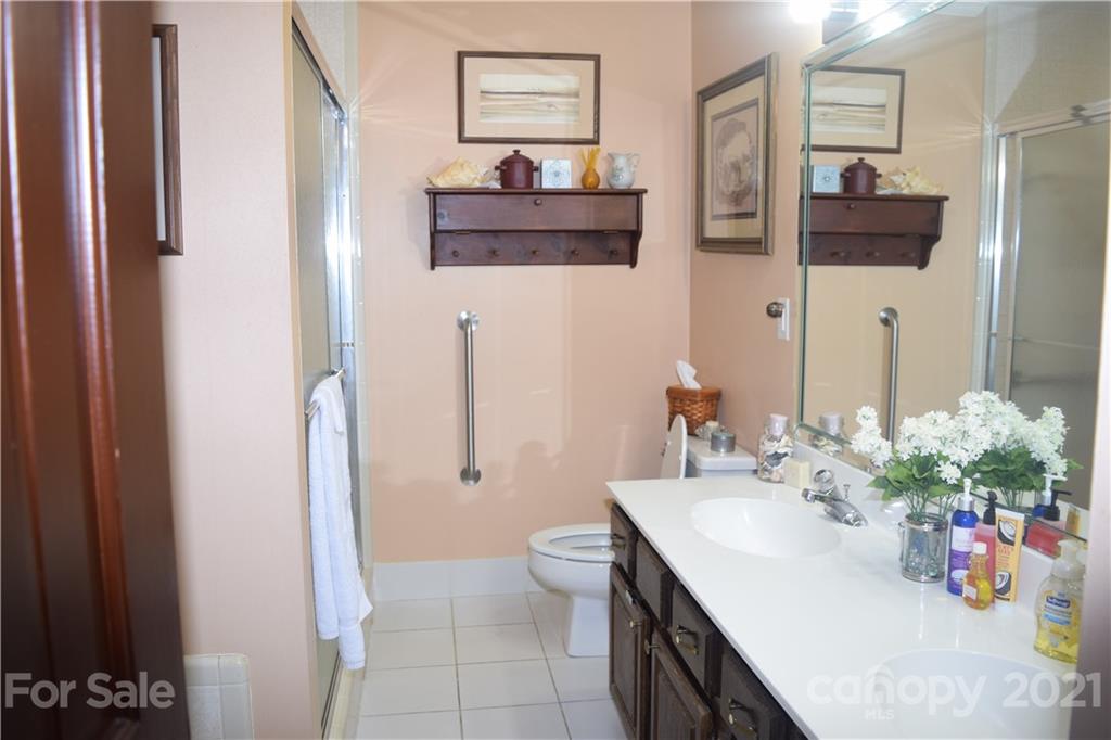 18 Shipmaster Court Lake Wylie, SC 29710 - Photo 18 of 34 a bathroom with a sink and a mirror