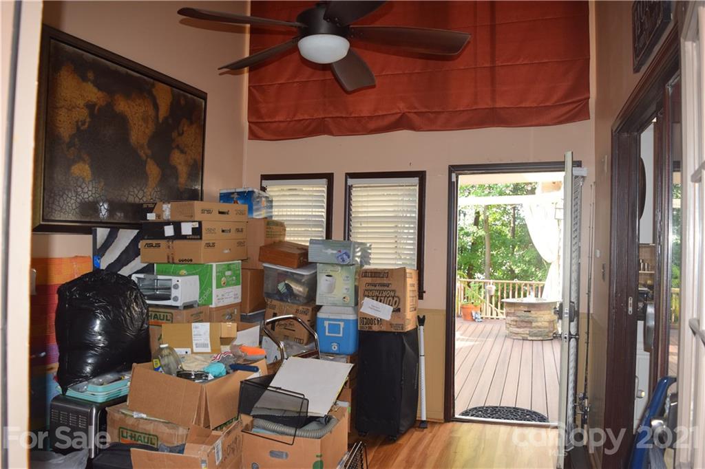 18 Shipmaster Court Lake Wylie, SC 29710 - Photo 19 of 34 a room with furniture and a flat screen tv