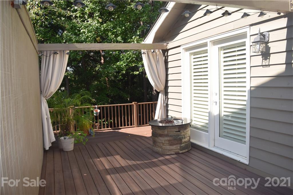 18 Shipmaster Court Lake Wylie, SC 29710 - Photo 21 of 34 a balcony with wooden floor and outdoor space