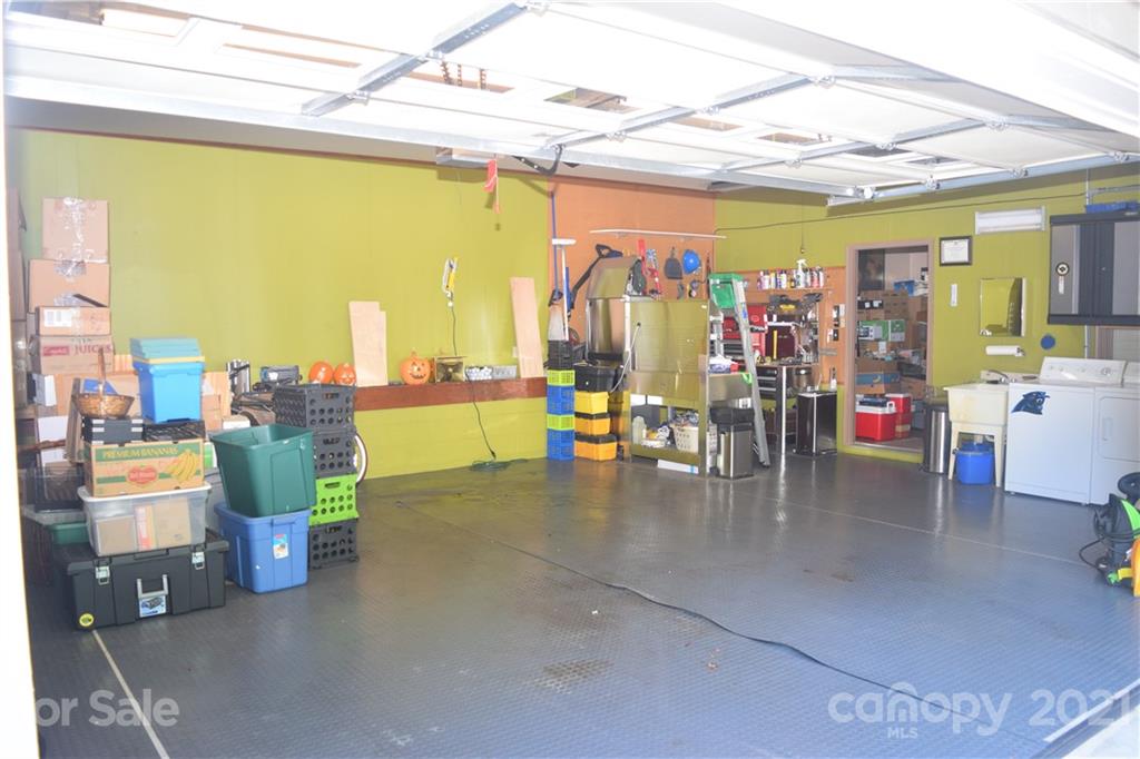 18 Shipmaster Court Lake Wylie, SC 29710 - Photo 26 of 34 a dining room with furniture and a floor to ceiling window