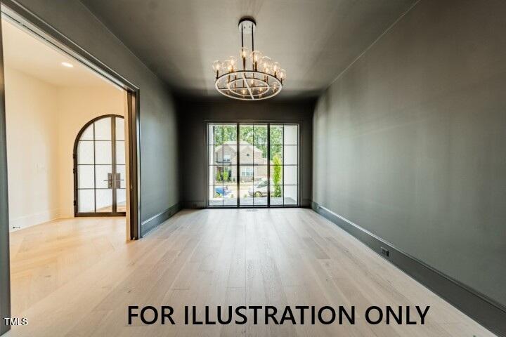 3422 Redbud Lane Raleigh, NC 27607 - Photo 6 of 14 a view of an empty room with a window