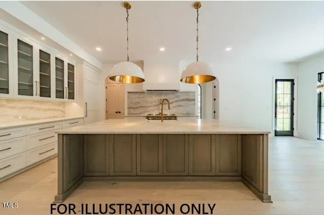 a large white kitchen with a large stove a sink and dishwasher