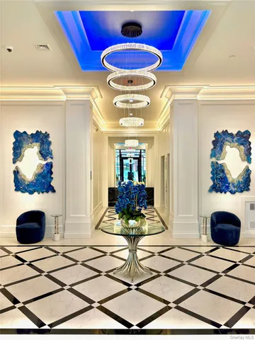 a living room with a rug and a rug