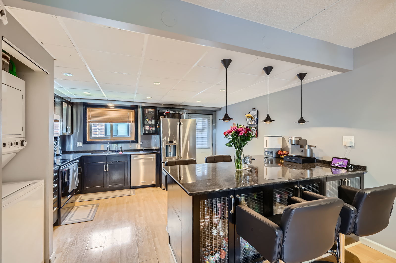 953 North Rohlwing Road, Unit 201A Addison, IL 60101 - Photo 4 of 11 a view of a dining room with furniture and chandelier