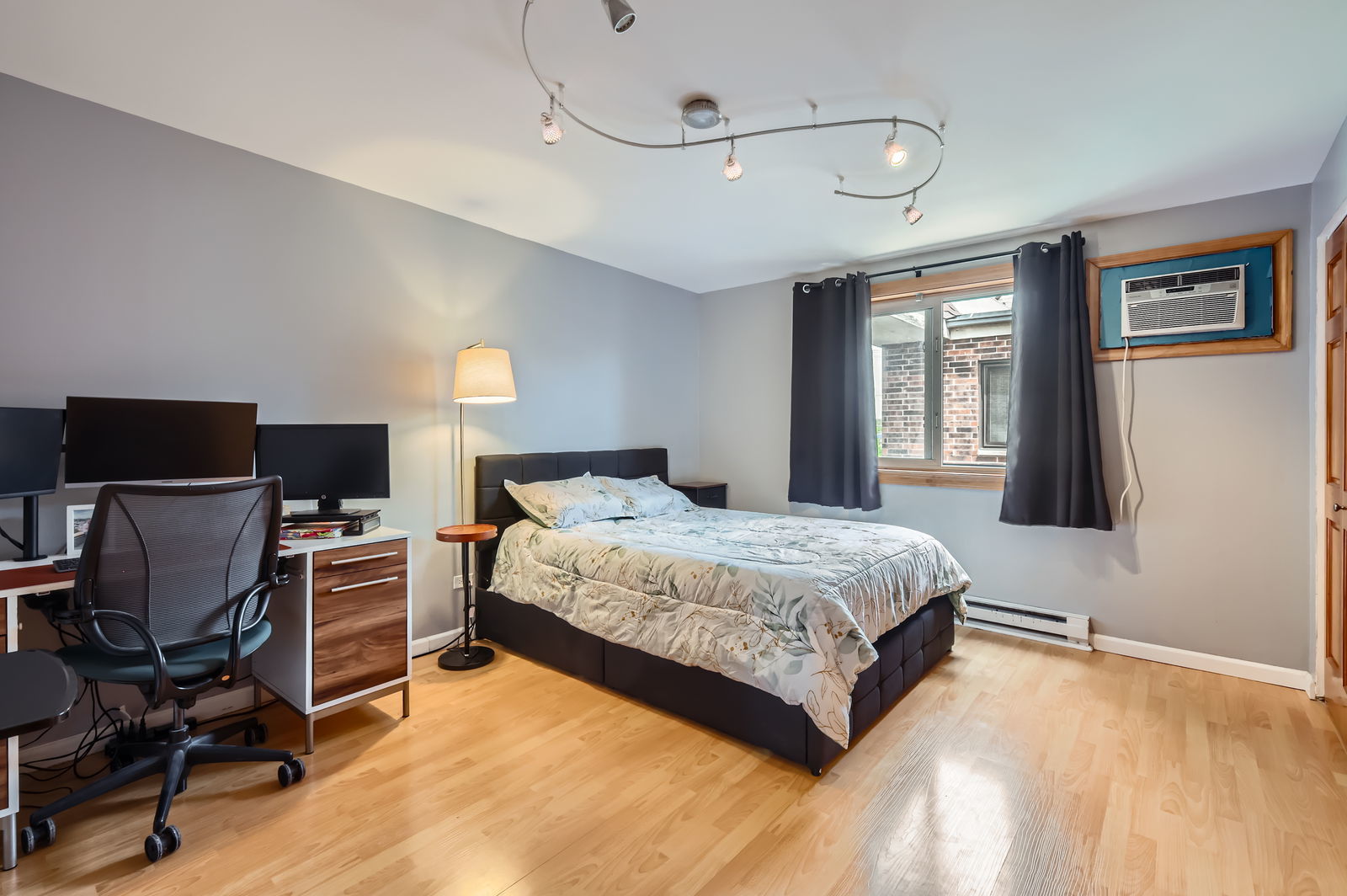 953 North Rohlwing Road, Unit 201A Addison, IL 60101 - Photo 7 of 11 a spacious bedroom with a bed and furniture