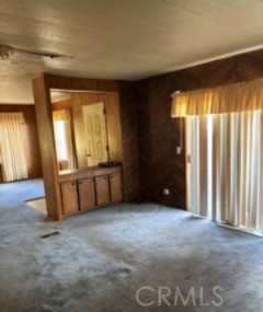 5937 Grove Street Lucerne, CA 95458 - Photo 7 of 12 an empty room with windows and closet