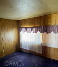 5937 Grove Street Lucerne, CA 95458 - Photo 9 of 12 a view of a room with wooden walls