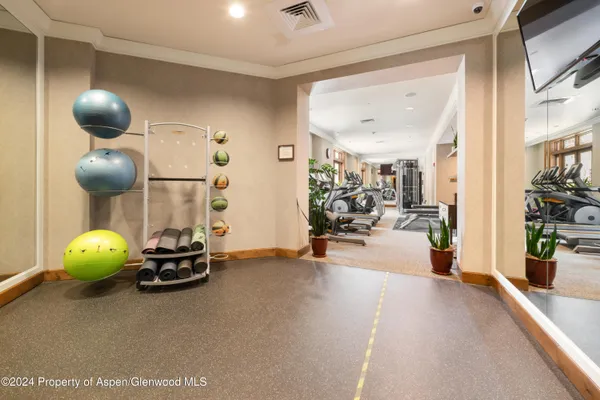 a view of a room with gym equipment