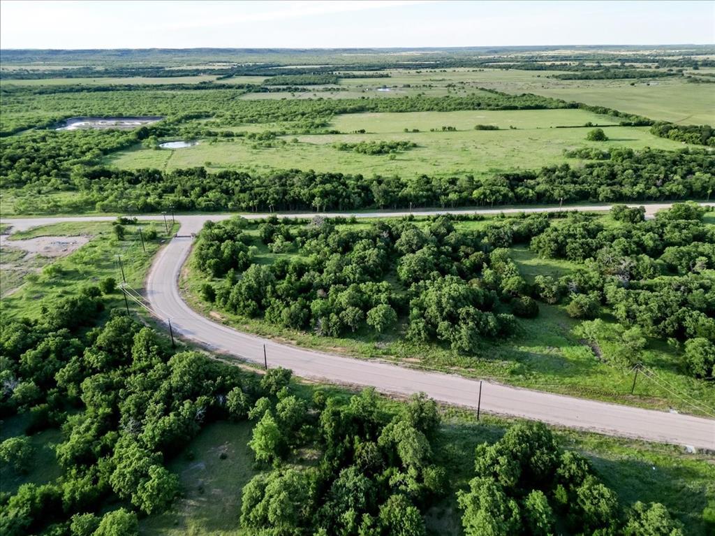 Tbd Tbd Rambling Road Perrin, TX 76486 - Photo 4 of 21 a view of a field with an ocean