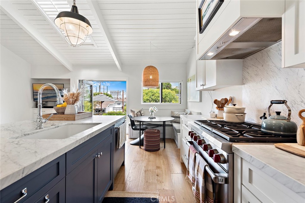 721 Browncroft Road Laguna Beach, CA 92651 - Photo 2 of 42 a kitchen with a stove a sink and a refrigerator