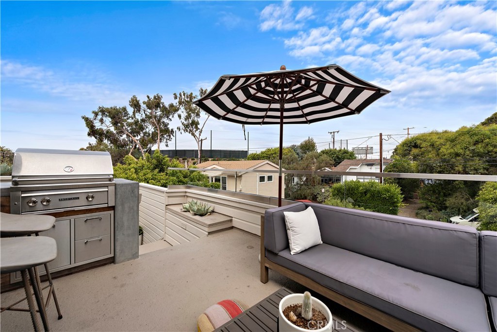 721 Browncroft Road Laguna Beach, CA 92651 - Photo 21 of 42 a view of sitting area in the backyard