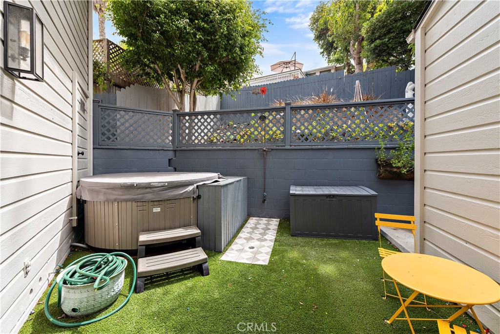 721 Browncroft Road Laguna Beach, CA 92651 - Photo 25 of 42 a view of a chairs and table in backyard