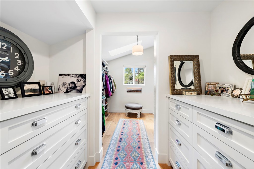 721 Browncroft Road Laguna Beach, CA 92651 - Photo 27 of 42 a view of a double vanity sink and a mirror