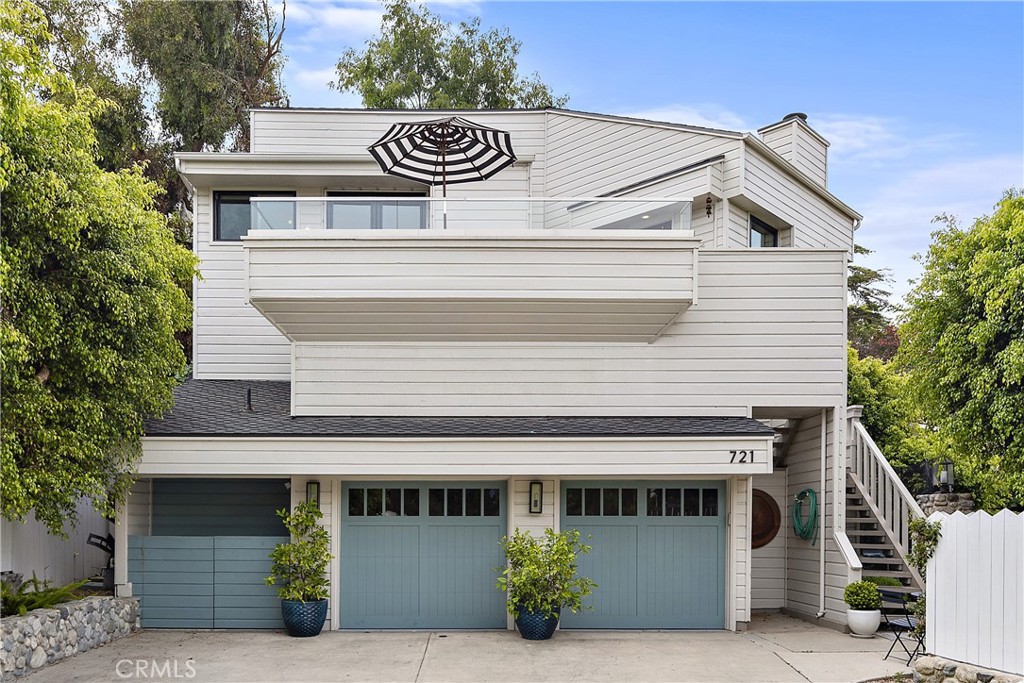 721 Browncroft Road Laguna Beach, CA 92651 - Photo 40 of 42 a front view of a house with garage