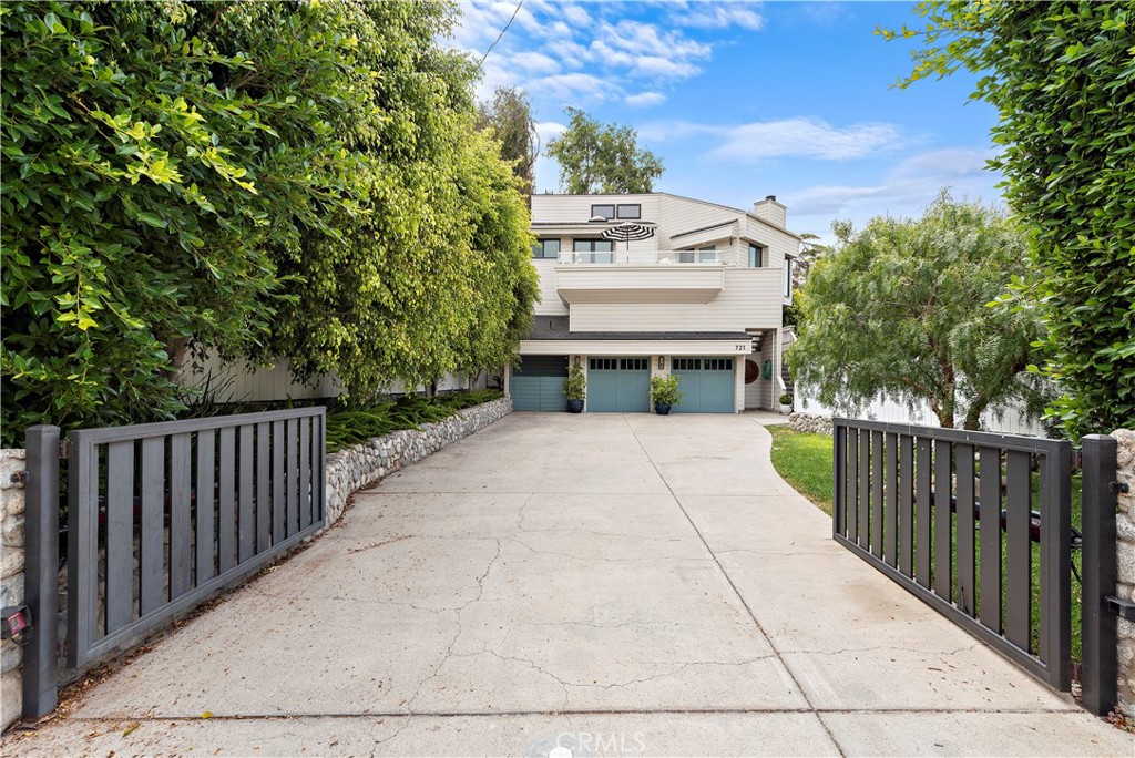 721 Browncroft Road Laguna Beach, CA 92651 - Photo 41 of 42 a view of a house with a small yard and wooden fence