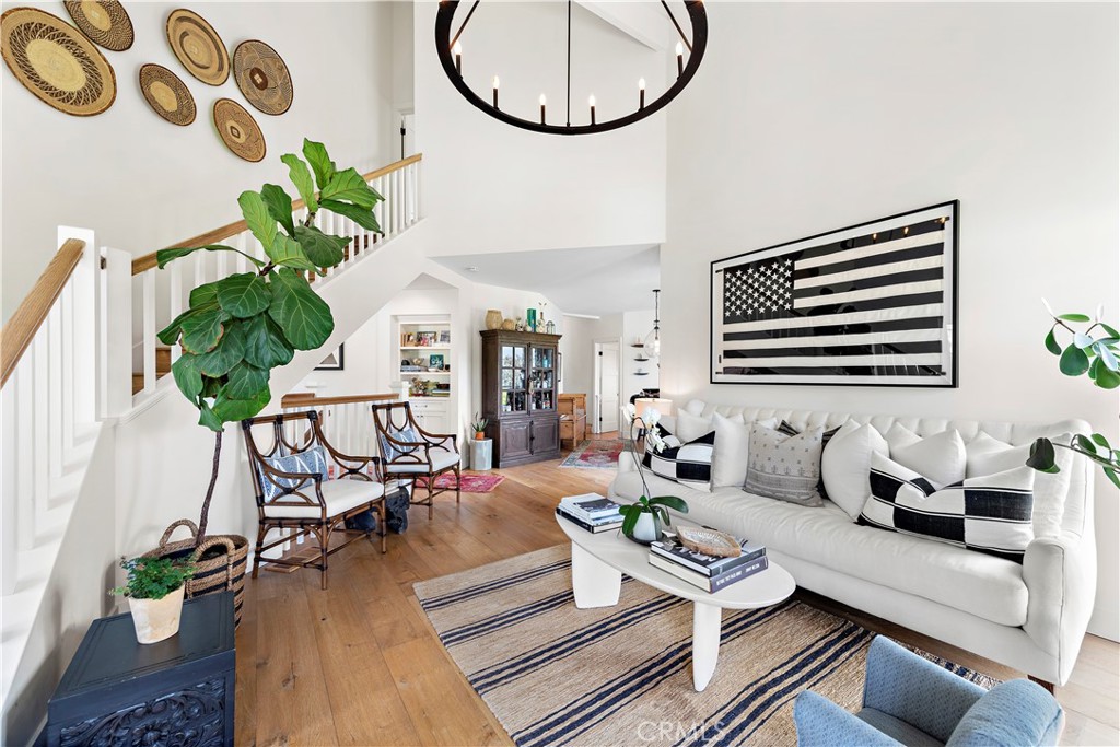 721 Browncroft Road Laguna Beach, CA 92651 - Photo 9 of 42 a living room with furniture and a potted plant