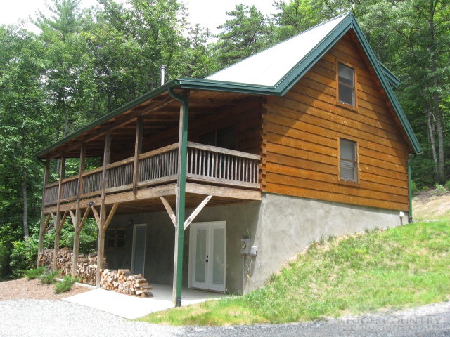 692 Mt Paron Road Deep Gap, NC 28618 - Photo 1 of 10 a front view of a house with garden