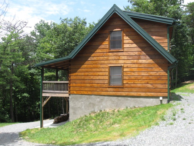 692 Mt Paron Road Deep Gap, NC 28618 - Photo 2 of 10 a view of house with backyard