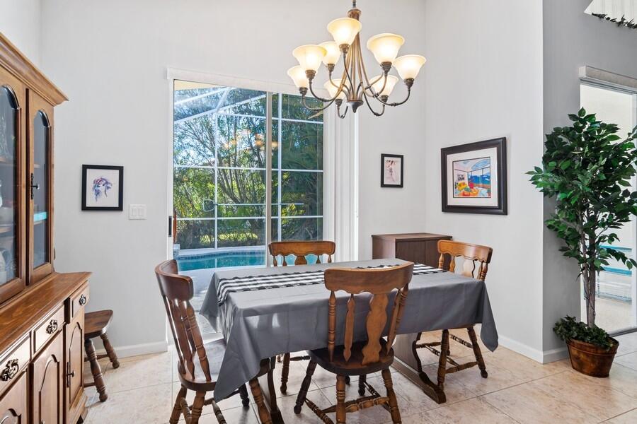 315 Springview Loop Port St. Lucie, FL 34986 - Photo 6 of 51 09_315NWSpringviewLoop_2_DiningRoom_LowR