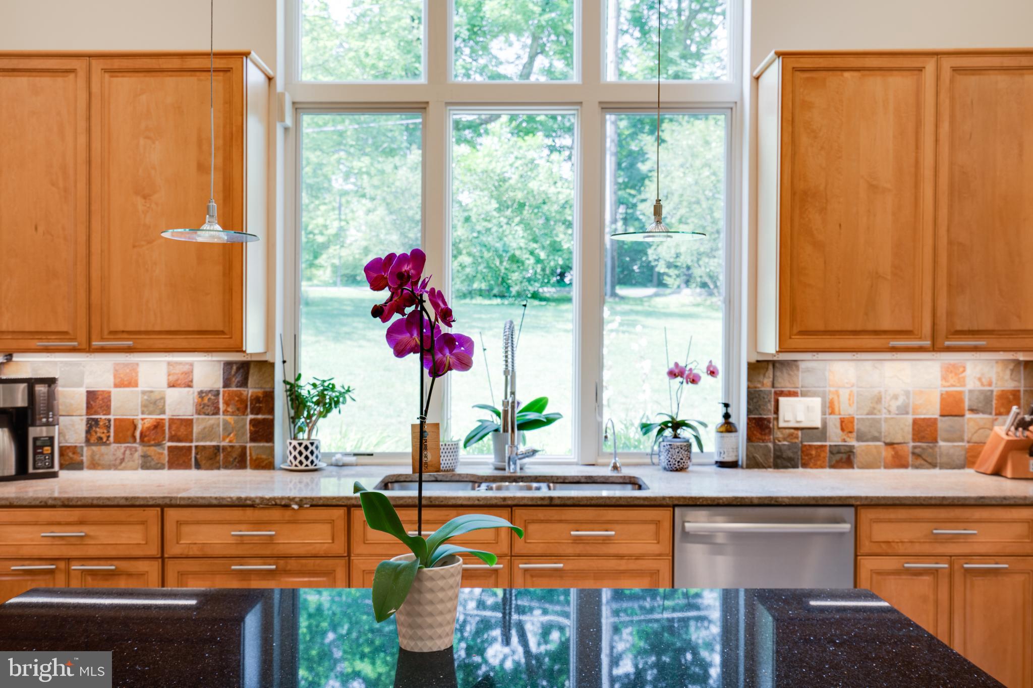 1501 Mt Pleasant Road Villanova, PA 19085 - Photo 21 of 49 a kitchen with a window a sink and cabinets