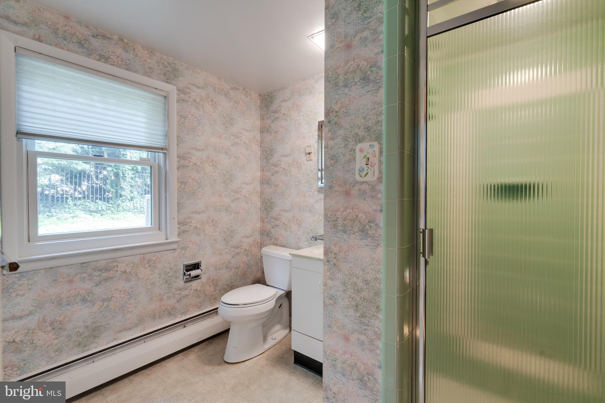 1501 Mt Pleasant Road Villanova, PA 19085 - Photo 24 of 49 a bathroom with a toilet and a shower