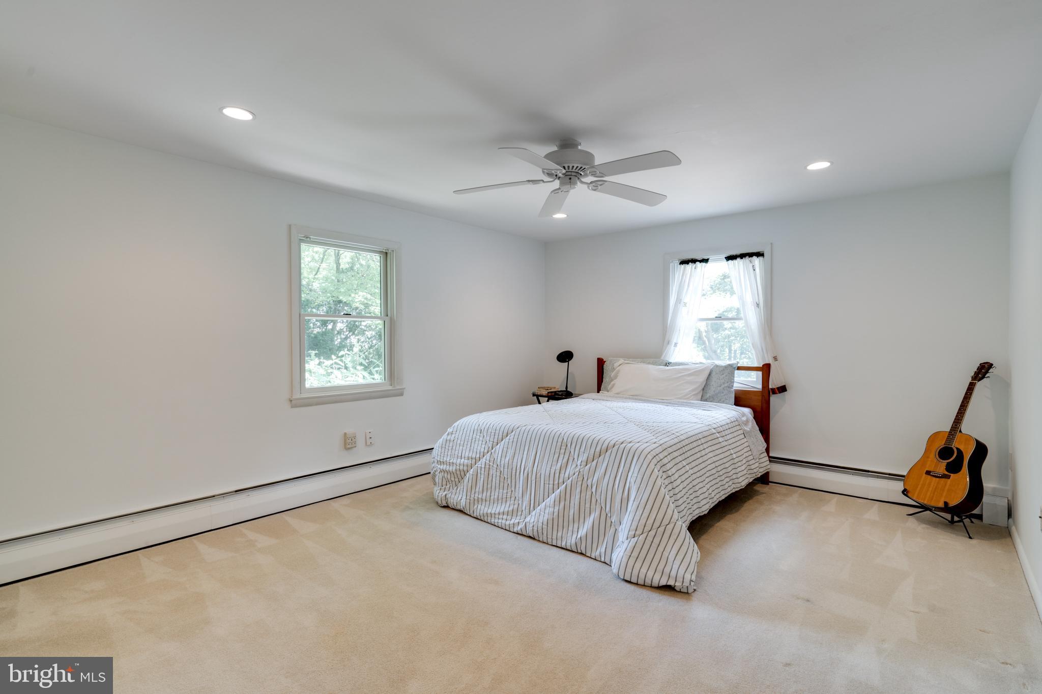 1501 Mt Pleasant Road Villanova, PA 19085 - Photo 28 of 49 a spacious bedroom with a bed and a window