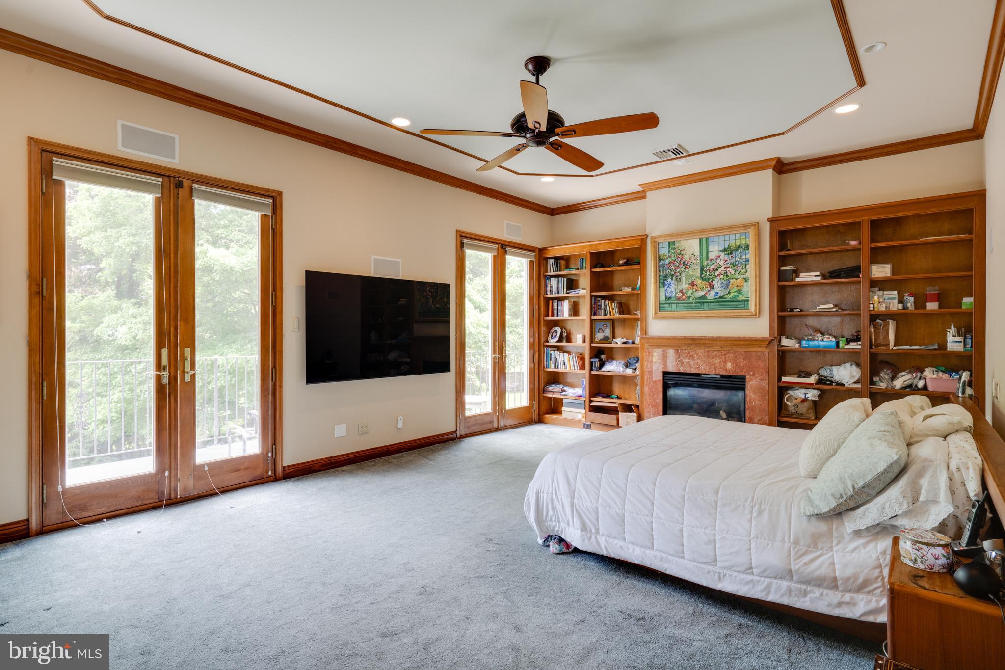 1501 Mt Pleasant Road Villanova, PA 19085 - Photo 35 of 49 a living room with furniture a ceiling fan and a window