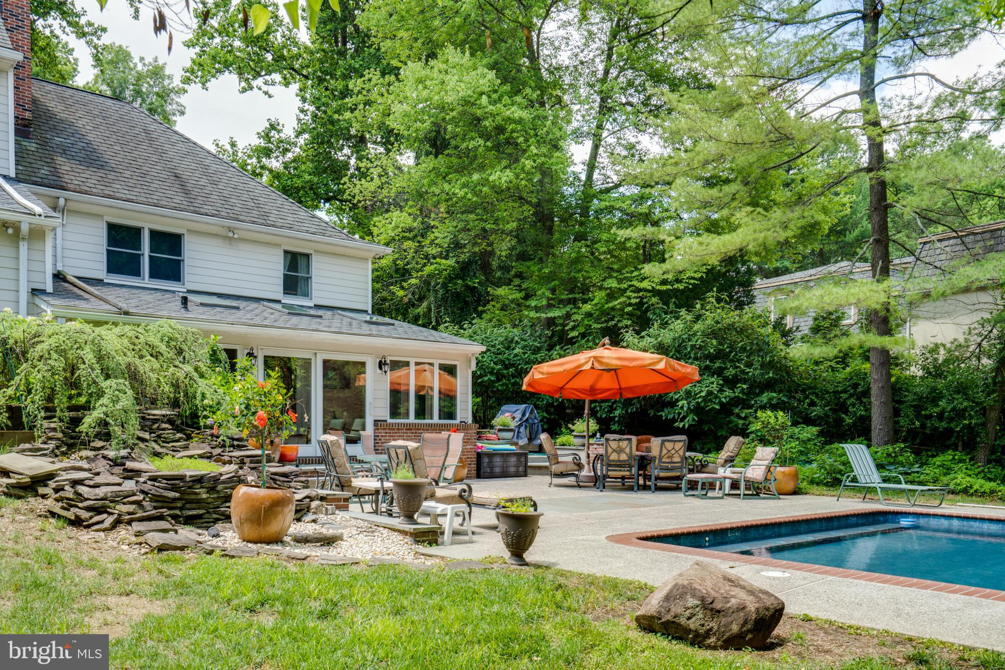 1501 Mt Pleasant Road Villanova, PA 19085 - Photo 45 of 49 a view of a house with swimming pool and sitting area