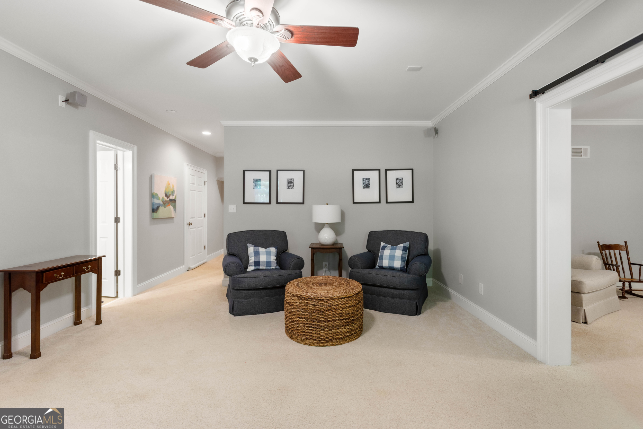 1030 Spring Lake Drive Bishop, GA 30621 - Photo 41 of 53 a living room with furniture and a chandelier
