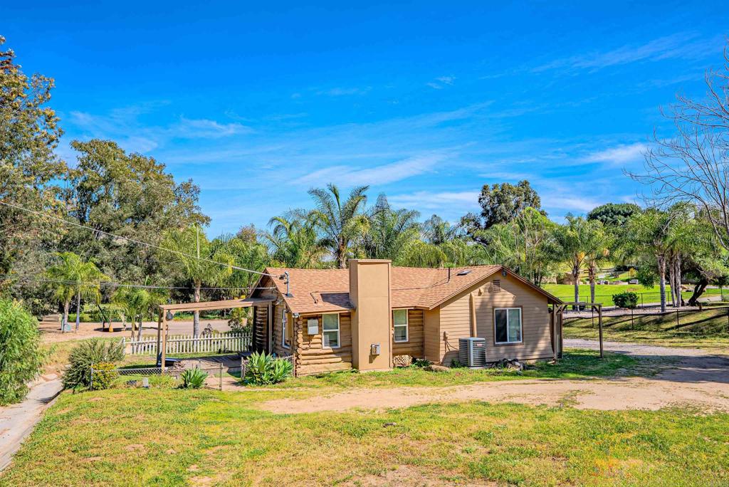 11977 Demi Lee Lane Lakeside, CA 92040 - Photo 13 of 22 a view of a house with a yard