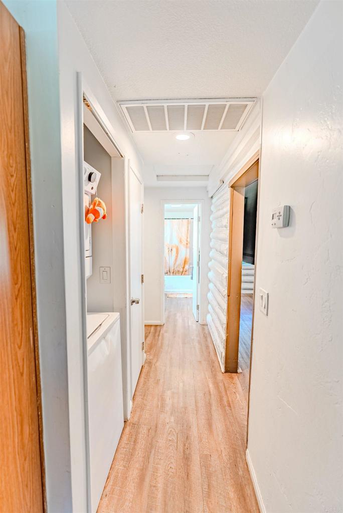 11977 Demi Lee Lane Lakeside, CA 92040 - Photo 19 of 22 a view of a hallway with wooden floor and closet